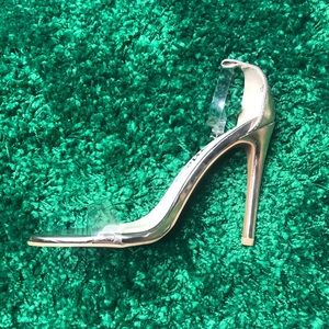 Never worn rose gold with clear strap high heels
